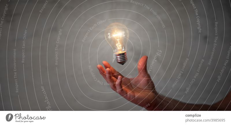 Innovation, Idea & Brainstorm - Light bulb in hand Light (Natural Phenomenon) Creativity Concrete Invention Electric bulb Inspiration Innovative Interest Hand