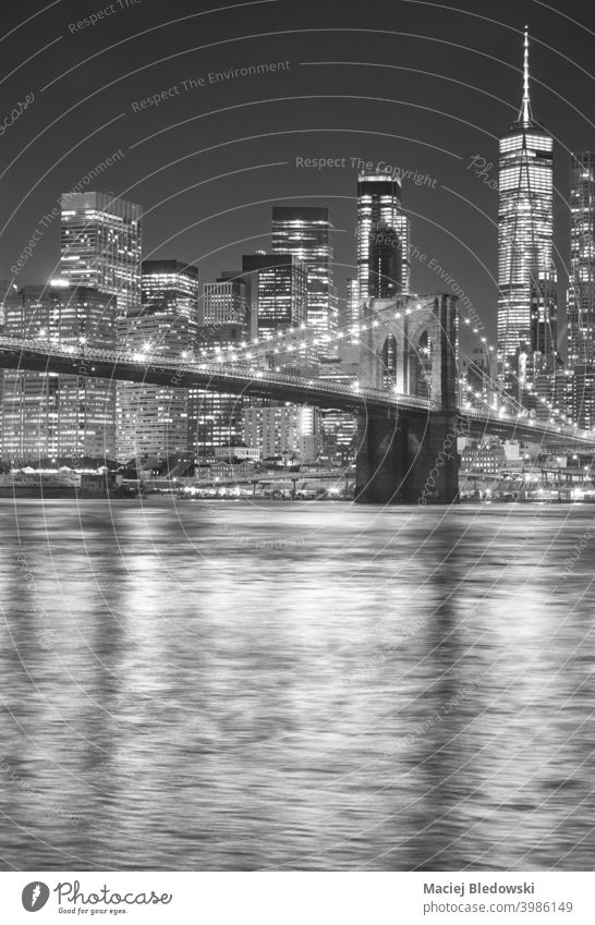 Black and white picture of Brooklyn Bridge at night, New York City, USA. brooklyn bridge city black and white new york manhattan skyline usa skyscraper urban