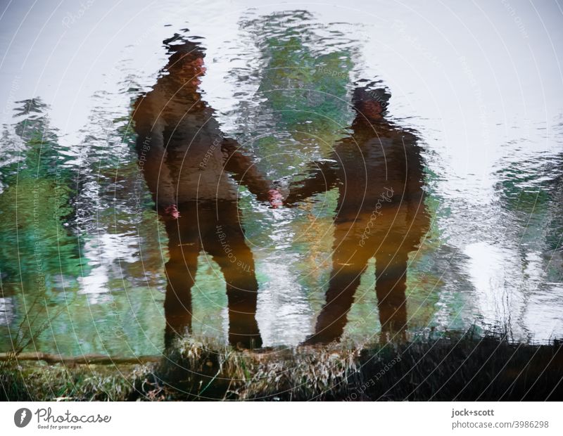 Contemporary history, covenant for life in fluid change Reflection Pond Married couple Surface of water Nature Calm bank Grass Silhouette Shore of a pond