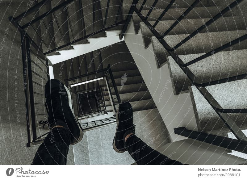 High view of the stairs and man shoes from above. building square black selfie lifestyle shadows depth vertigo Stairs Architecture Building Square Interior shot