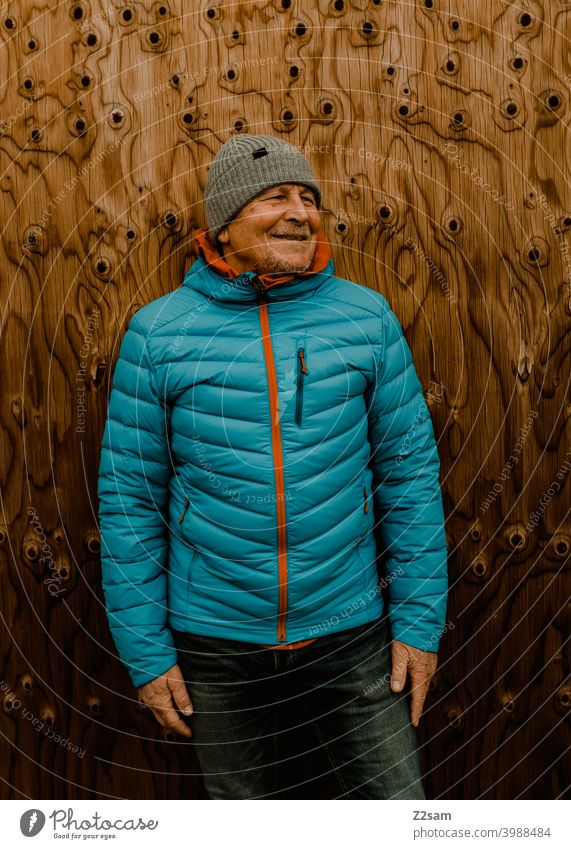 Portrait of a sporty pensioner Athletic Pensioners Man fortunate Facial hair Cap Jacket outtdoor Cool relaxed annuity Retirement Contentment Winter chill
