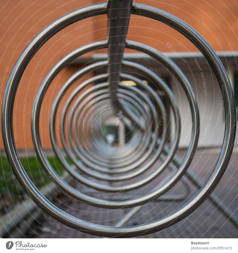 View inside the bike rack Bicycle Bicycle rack Round Circle Steel High-grade steel bare Symmetry symmetric structure Town Day Deserted Metal Close-up Cycling
