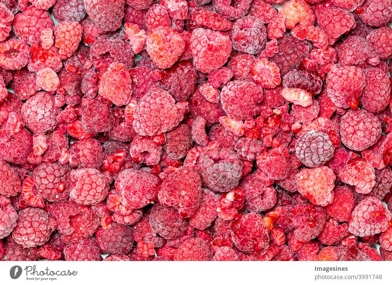 Frozen raspberries background Raspberry from on high backgrounds Berries Close-up Cold cold temperature color picture fruit Product Dessert top view Eating