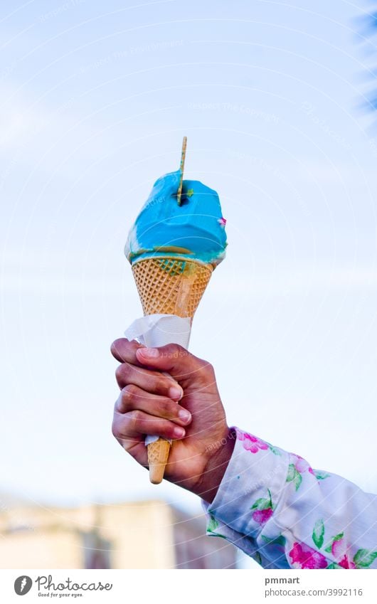 ice cream cone, fresh for your hot summer, with many delicious flavors, chocolate hazelnut pistachio vanilla fruit candied fruit rum raisin Brown calories candy