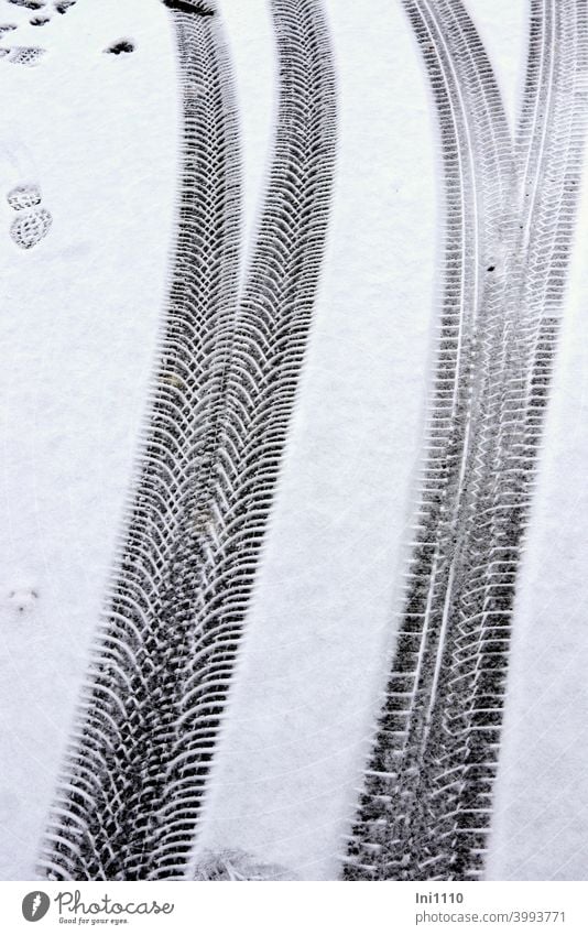 Traces of different tyre treads in the snow Tracks Profile Tire tread Snow disparate footprint Winter Fork Imprint structure Tyre print Cold Street snowy road