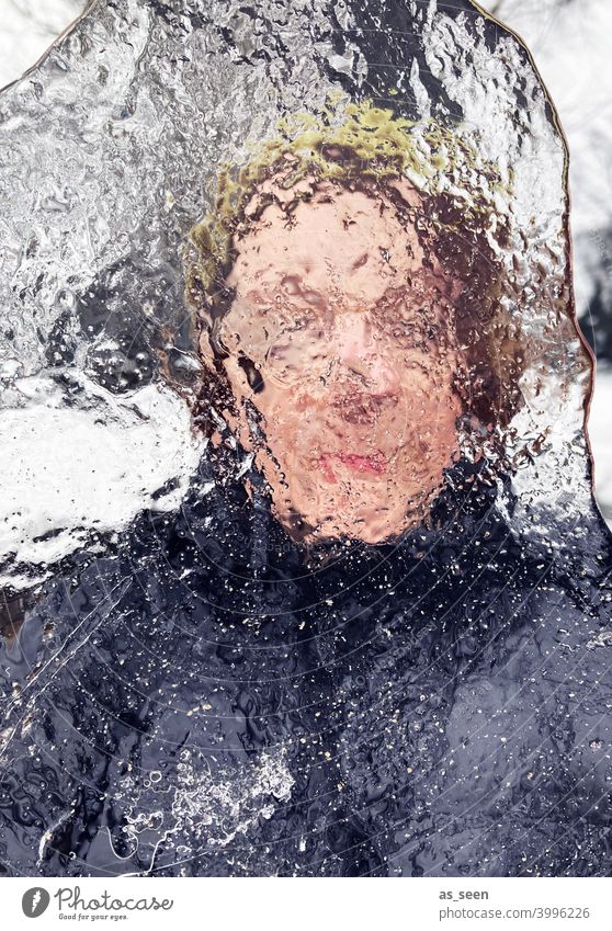 Woman looking through ice floe Vista hazy Eyes Face Human being Adults 1 Feminine Looking Transparent Looking into the camera Head Day Colour photo Winter Ice