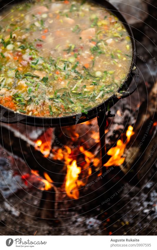 Camping and making soup in forest. fire camp camping relax nature natural fish warm warmfood delicious