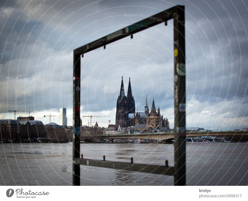 framed Cologne Cathedral . Rhine at high water Central Flood Rhine flood dramatic sky Landmark Tourist Attraction River Downtown Bridge Vista Dome Evening