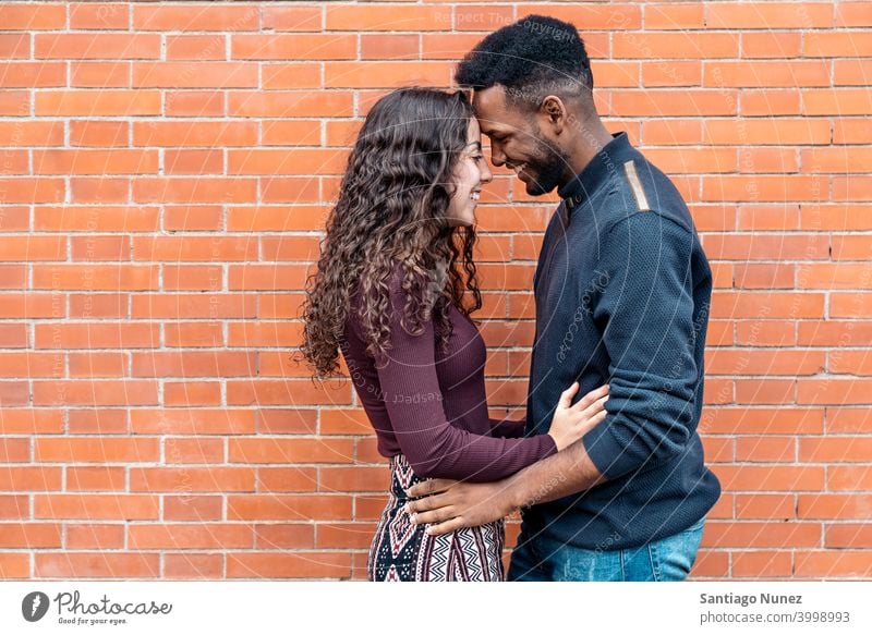 Happy Interracial Couple kissing couple relationship interracial couple black afro african american diversity multi-racial black man ethnic multi-cultural