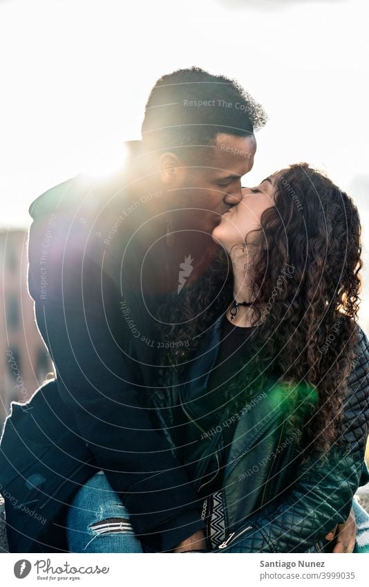 Interracial Couple Kissing kissing couple relationship interracial couple black afro african american diversity multi-racial black man ethnic multi-cultural