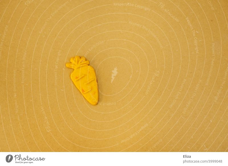 Carrot on yellow background carrot Yellow Orange Cookie Easter Vitamin B good for the eyes
