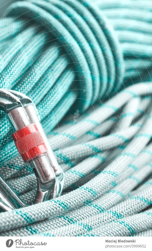 Close up picture of a climbing carabiners and ropes. safety close up sport rock climbing pattern lifestyle adventure detail concept strength photo nylon