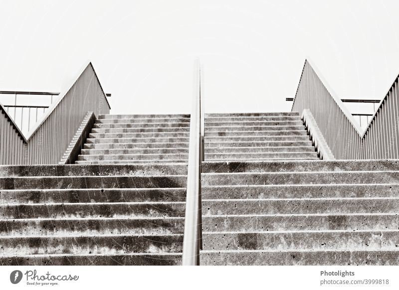 Stairs divided by metal bar stagger Sky Architecture Upward Banister rail Downward Deserted Go up Descent Black White Gray Metal frowzy External Staircase