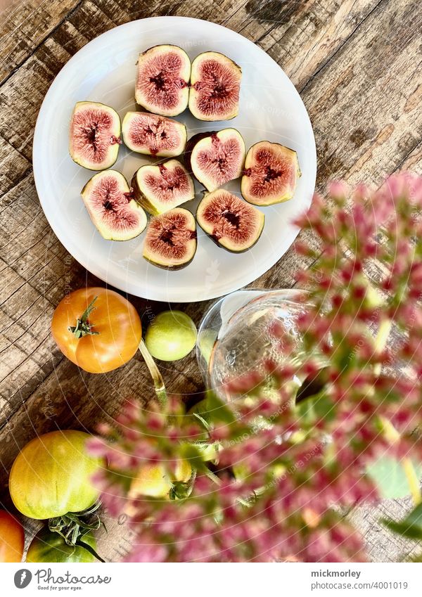 Fresh figs Figs Fruit garden fruit fresh from the summer Wooden table Snack Snackbar Healthy salubriously healthy lifestyle Healthy Eating Tomato tomatoes