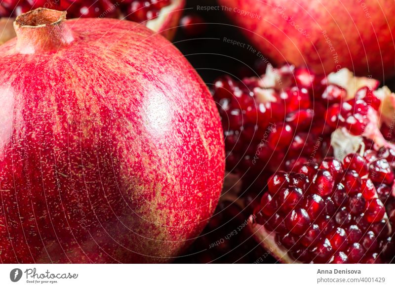 Ripe Open Pomegranate pomegranate background fruit ripe red healthy food organic vegetarian seed juicy fresh half sweet raw nature wooden space slice freshness