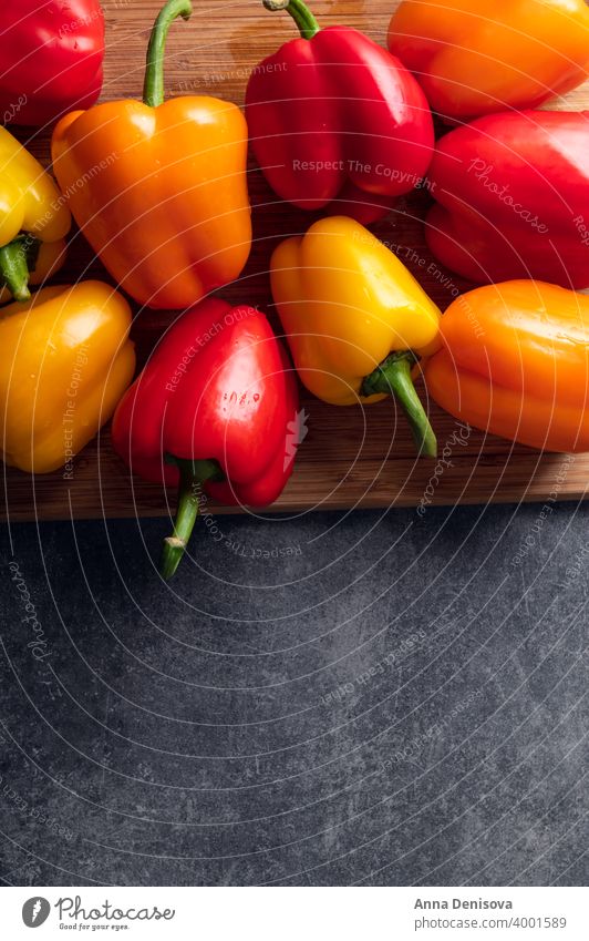 Orange, red and yellow bell peppers organic capsicum vegetable paprika orange colorful fresh healthy ingredient food freshness salad eat diet cooking nutrition