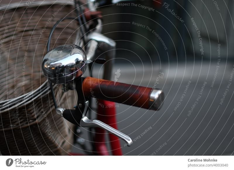 Bicycle handlebar with bell, handle and basket Cycling Exterior shot Colour photo Deserted Day Means of transport Transport Lanes & trails Road traffic