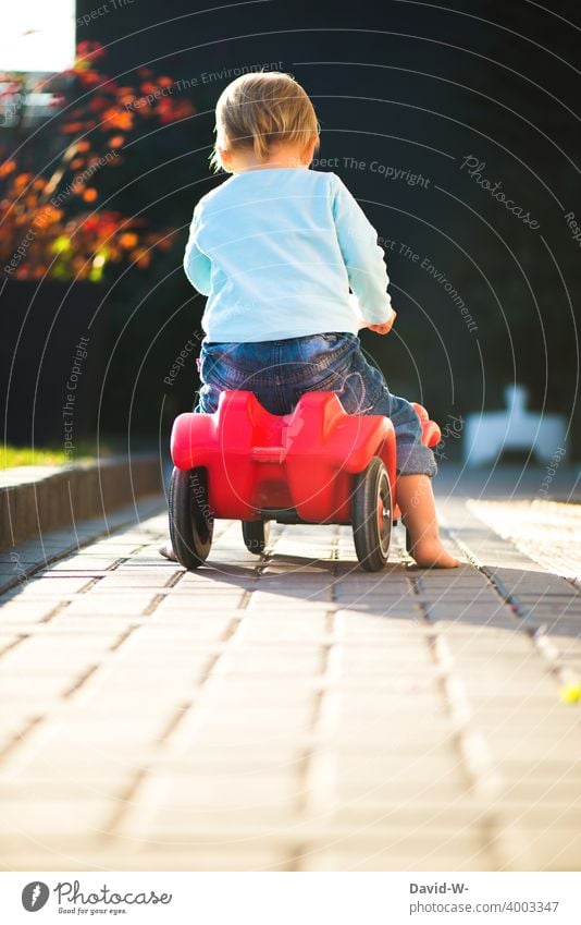 Child on the road with the Bobby-Car Bobbycar Joy out Toddler Driving Infancy Summer Study