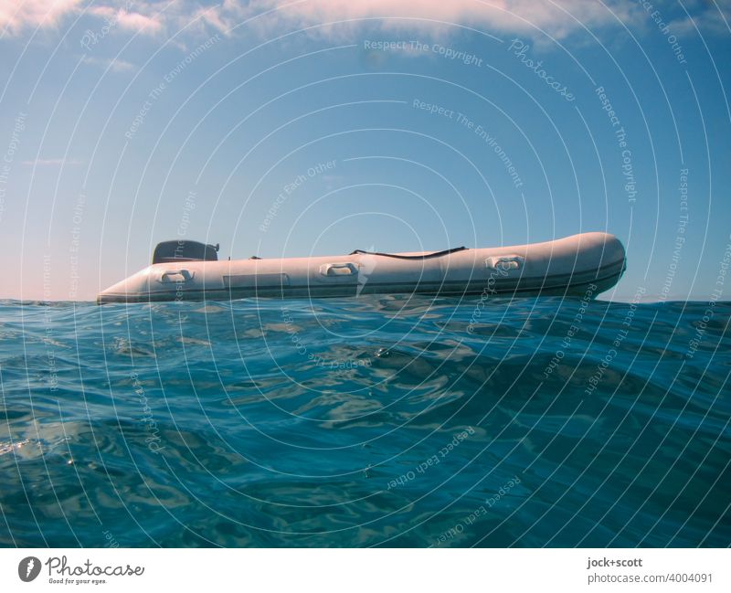 Now, hurry up... small motorboat Pacific Ocean Dinghy open sea Waves Undulation Swell Movement Surface of water Neutral Background Sky Glittering Motorboat