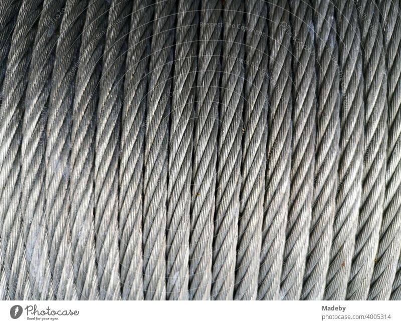 Solid steel rope rolled up on a drum in the climbing park Bielefeld at the Johannisberg in the Teutoburg Forest in East Westphalia-Lippe Rope steel cable