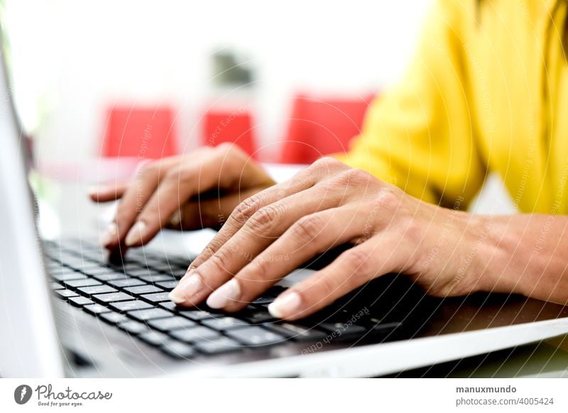 woman hands typing on laptop, office concept yellow working Workplace