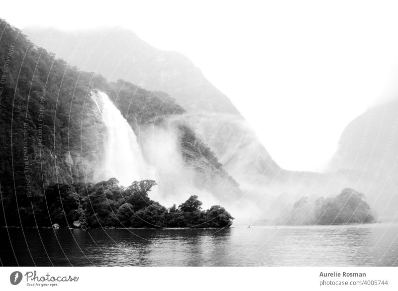 Milford Sound waterfalls, New Zealand background fog misty Waterfall Black & white photo landscape nature famous place loch valley montains