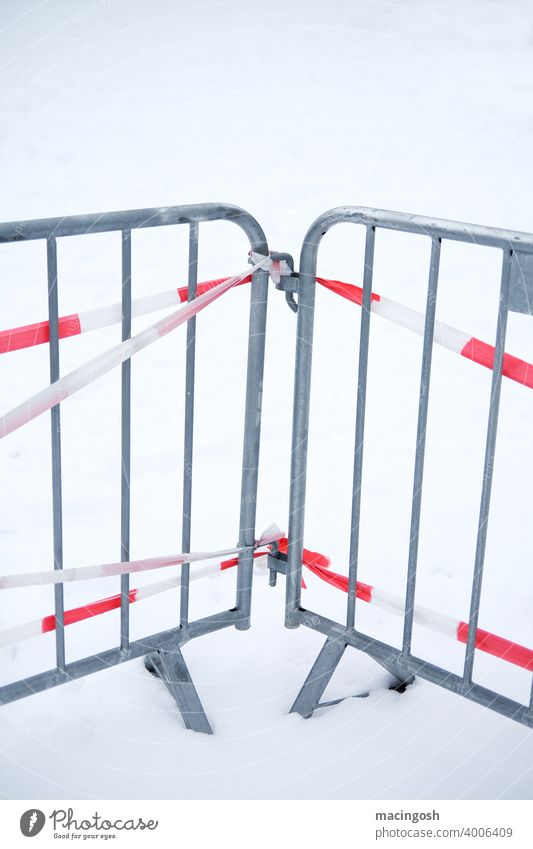 Barrier fences on a snowy area barrier fence cordon Safety Construction site Deserted Structures and shapes Bans Hoarding Metalware Fence Exterior shot Winter