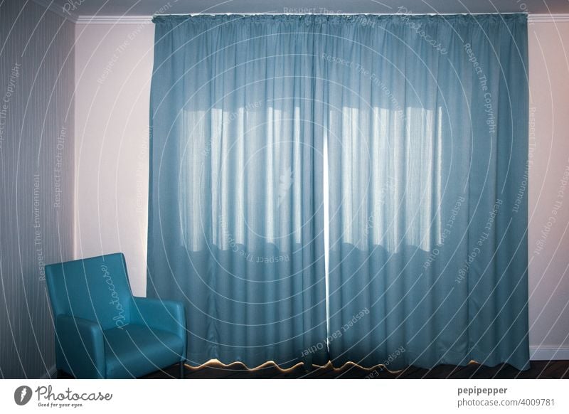 Hotel room with blue curtains and blue armchair Vacation & Travel Tourism Room Light Bedroom Drape Curtain closed curtain fabric Colour photo Interior shot