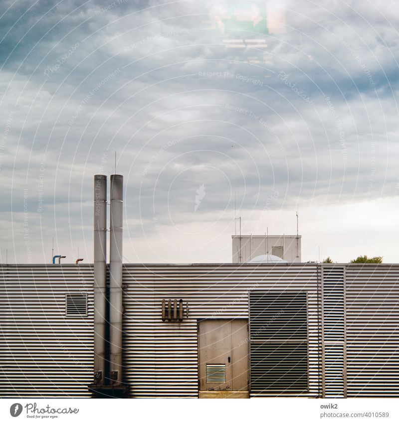 escape route Facade Boiler house Trigger Chimney door Corrugated sheet iron Metal Clouds lines Evening Parallel Wall (building) Detail Exterior shot Sky