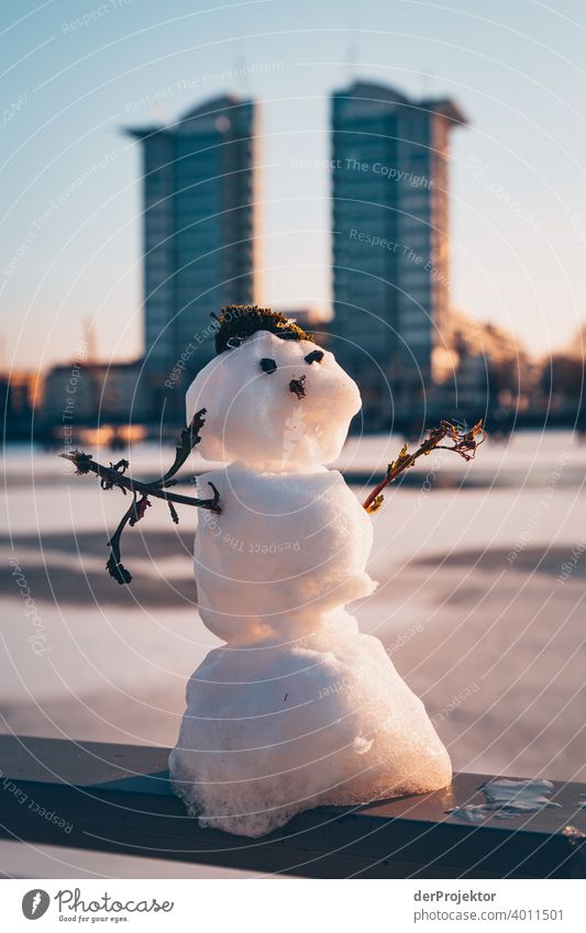 Snowman with winter view of the Spree with Twintowers Treptow Back-light floe Esthetic Rich in contrast Shadow play Sunbeam Winter mood Illustration Ice chill