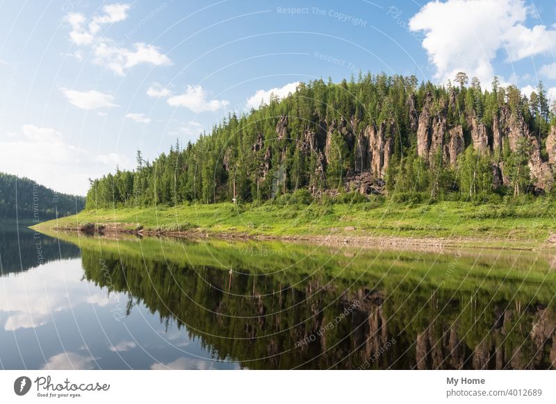 Beautiful Siberian rivers. Fantastical cliffs.Krasnoyarsk territory affluent blue clouds confluent coniferous conifers forest greenery landscape mount mountain