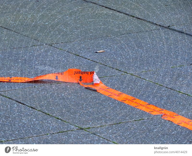 Red marker line detaching from the ground Marker line Adhesive tape Line Structures and shapes Colour photo Orange signal colour Deserted Exterior shot off