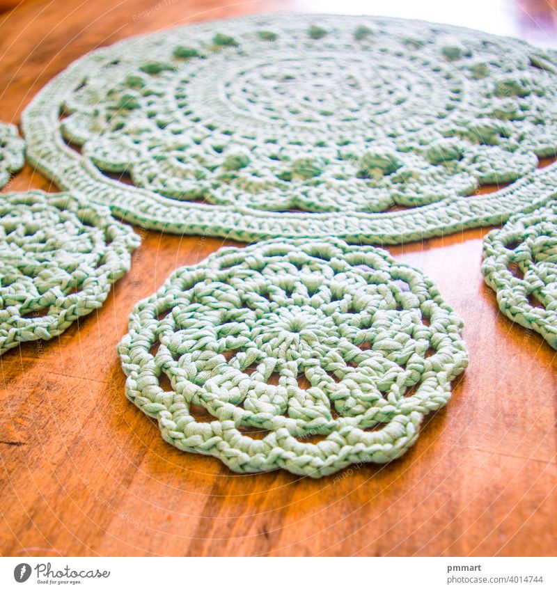 knitting, gorgeous light green centerpiece colorful handcrafted knitted coasters table wool winter handmade hobby soft wood warm ball thread home clothing
