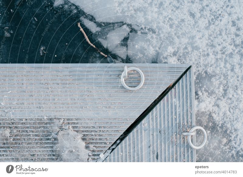 Edge of a footbridge over frozen water at a lake Footbridge Gray ultimate grey Blue Ice Frozen Lake Water Snow Winter Cold Ring Rings Divorce chill White Bright