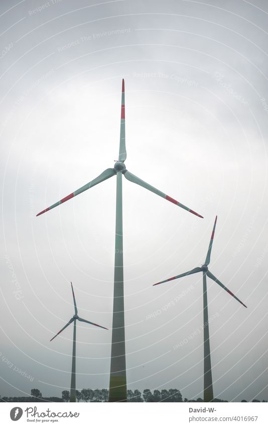 Wind energy - Wind turbines in nature windmills Pinwheel wind power Energy production Environment Wind energy plant Sustainability somber huge