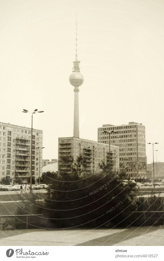 Repro of an old black and white photo from the 1970s showing the Berlin TV tower, the teacher's house and new buildings / analogue photography Berlin TV Tower
