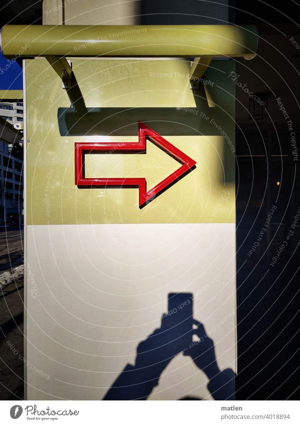 groundbreaking Street Arrow Shadow Red mobile Wall (building) Colour photo Signs and labeling Exterior shot Right Direction Signage Orientation Turn off