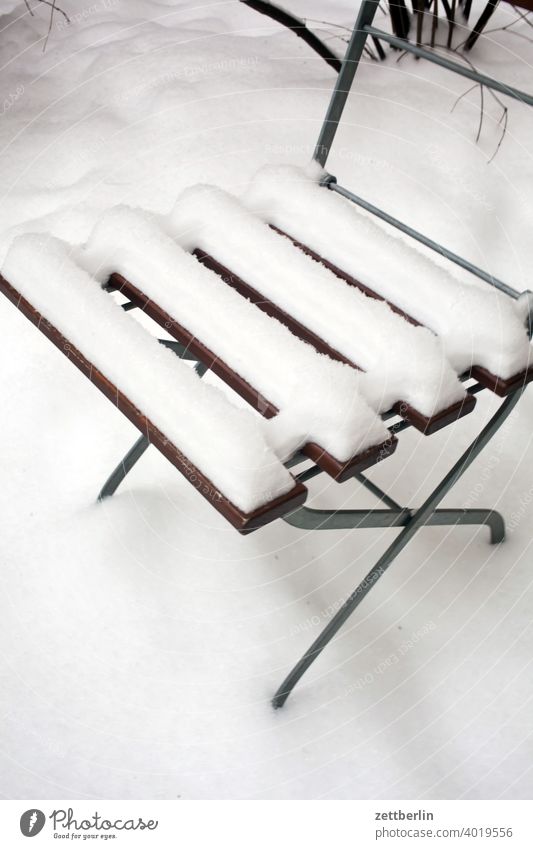 Garden chair in fresh snow Berlin Ice February holidays Frost jenuar Cold chill Virgin snow Snow Town urban Winter winter holidays January Chair Folding chair