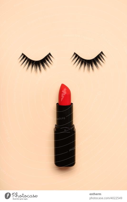 False eyelashes and red lipstick.Beauty and makeup concept false eyelashes people eyebrows brush nail object curve eyes facial pair accessory color background