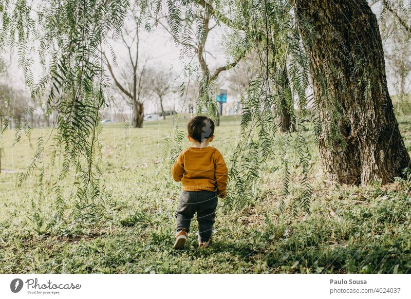 Child playing in the park Tree childhood 1 - 3 years Authentic Caucasian Colour photo explore Day Infancy Lifestyle Happiness Multicoloured Joy Happy