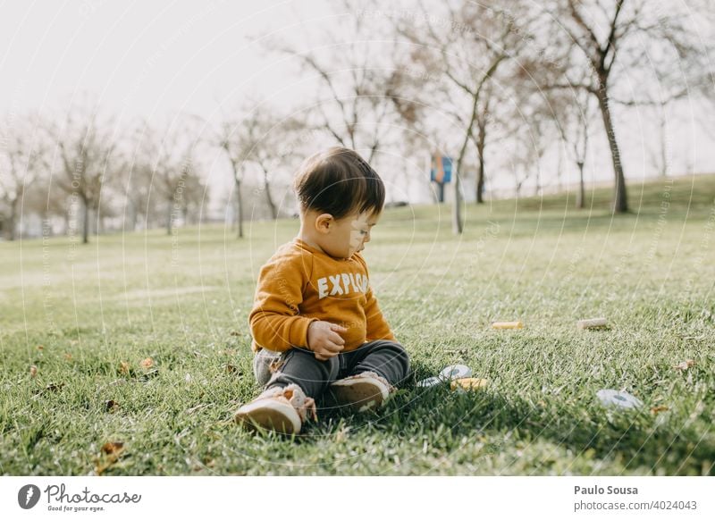 Child playing in the park childhood Caucasian Happy Childhood memory Happiness Authentic Joy Lifestyle Colour photo Infancy 1 - 3 years Playing