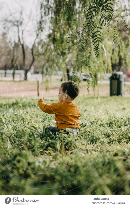 Toddler playing at the park Child childhood Park Spring Spring day Day people summer Colour photo Exterior shot Nature kid spring explore Curiosity Caucasian
