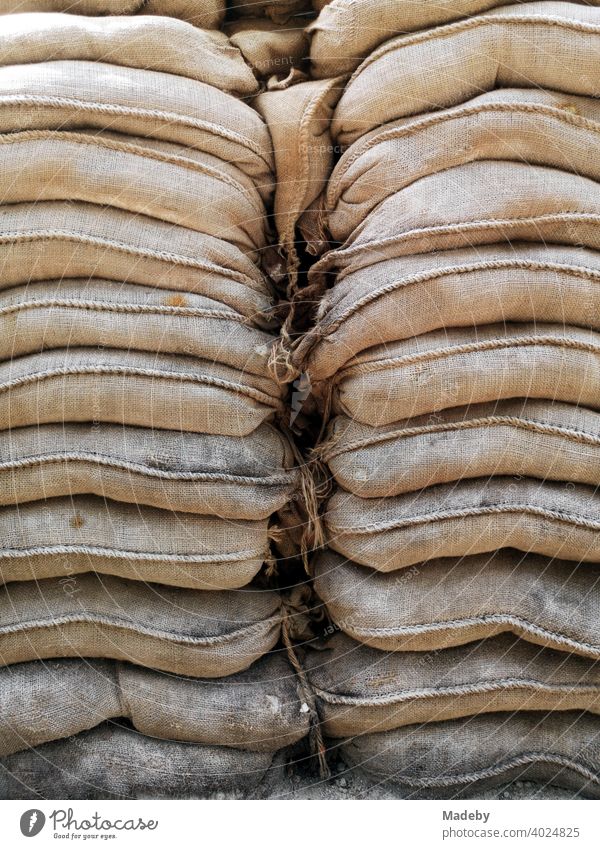 Historical close-up of the sandbags at the former Checkpoint Charlie in Friedrichstraße in the capital Berlin Sandbags Bags Protection Fortress checkpoint