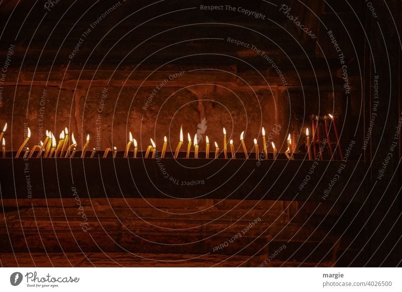 Lots of lit candles in a church! Candlelight Candle flame shoulder stand Deserted Flame Light Candlewick Illuminate Dark Fire Wax Bright Romance Burn Warmth