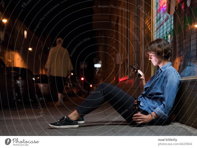 Typical nightlife? Exterior shot Colour photo Night Evening Dark Neon sign Illuminate Cellphone addicted to mobile phones social media social networks