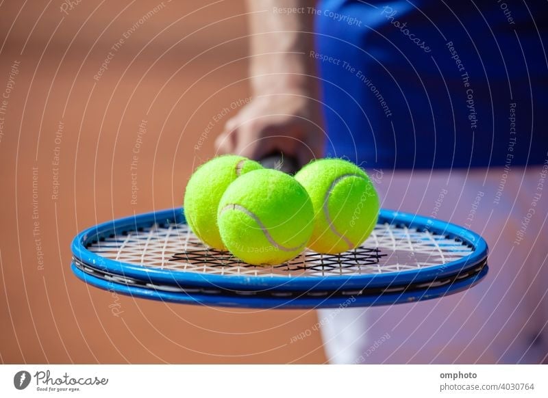 Tennis Player with Racket and Balls tennis sport racket ball court clay competition activity serving service game set professional play action player match man