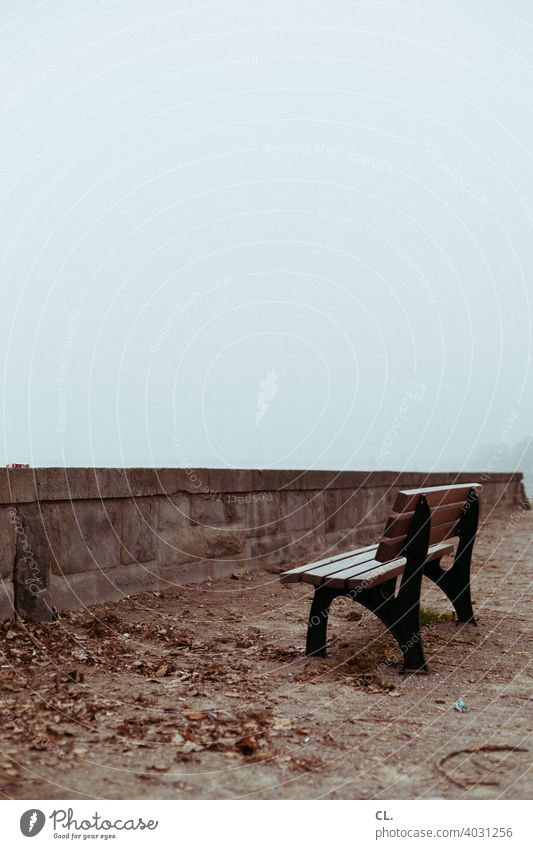 unpromising Bench Park bench Seating Wall (barrier) foggy Gloomy dreariness Loneliness silent tranquillity melancholy forsake sb./sth. Empty Wooden bench Winter