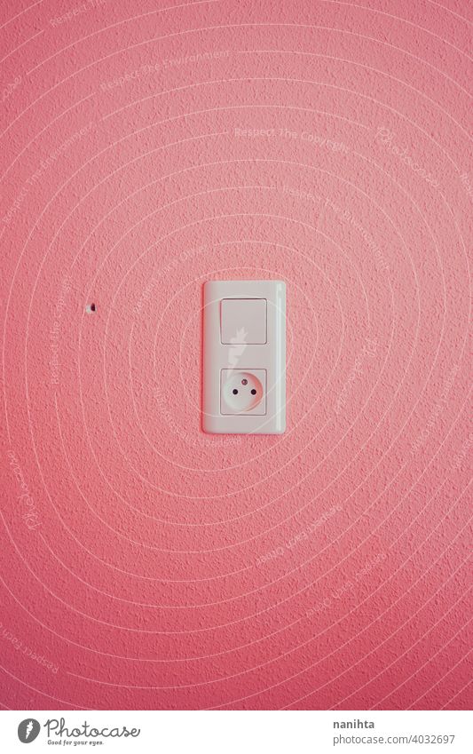 Minimal details in white in a pink room background texture decor home paint wall wallpaper minimal plug key electric electric outlet electricity energy switch