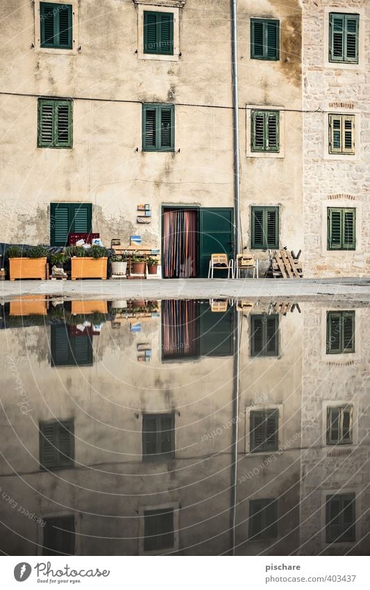 Somewhere in Croatia Village Fishing village Old town House (Residential Structure) Architecture Facade Window Symmetry Puddle Colour photo Exterior shot