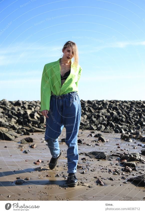 Lara Woman Beach jeans Jacket Sky Sand stones breakwater sunny Blonde Long-haired Going stylish Looking into the camera Horizon Beautiful weather Rotation